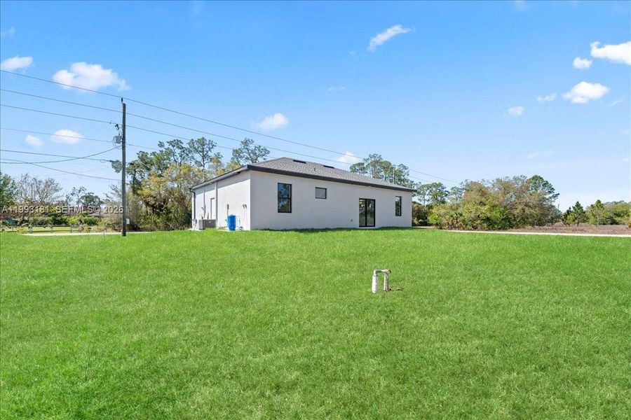 Exterior details and patio area of a home in , Lehigh Acres (Image 14).