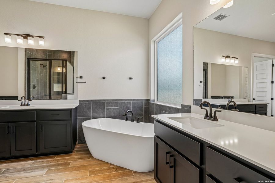 Furnished interior view inside a new home in Village at Three Oaks, Seguin (Image 9).