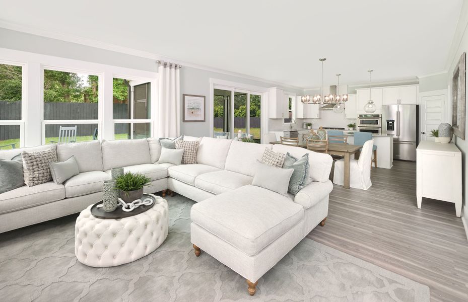 Large Gathering Room that looks over the Dining and Kitchen areas. Large Gathering Room that looks over the Dining and Kitchen areas.