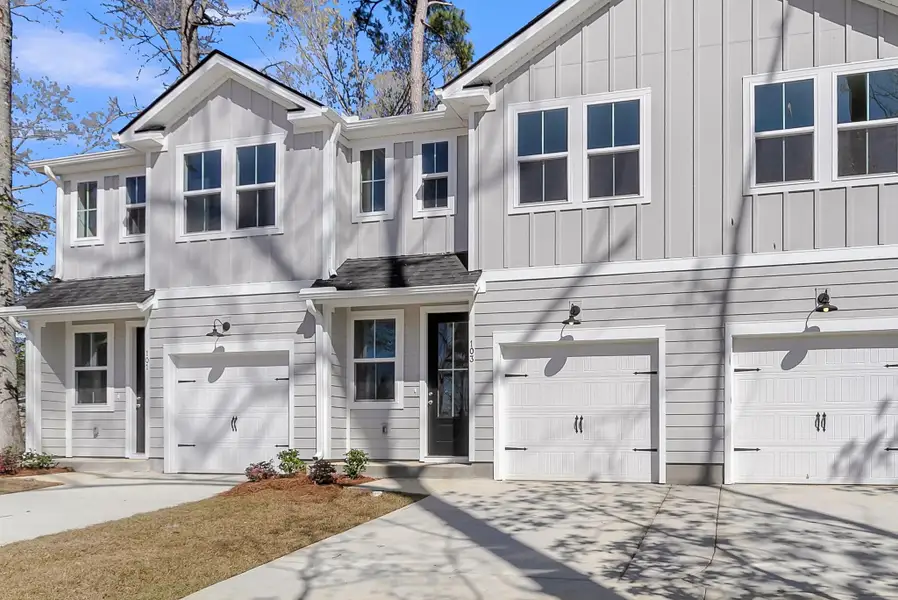 Front exterior of a new home in Windward Village, Summerville, SC, highlighting curb appeal (Image 2). Front exterior of a new home in Windward Village, Summerville, SC, highlighting curb appeal (Image 2).