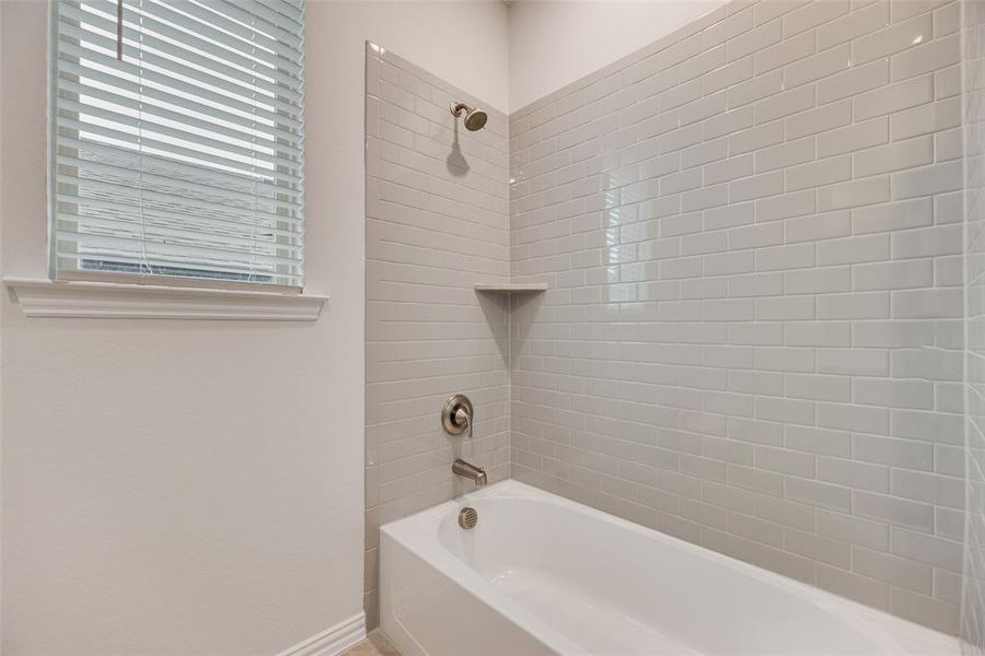 Furnished interior view inside a new home in Villages of Hurricane Creek, Anna (Image 4).