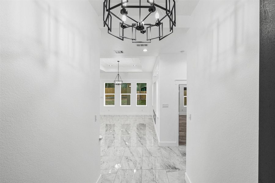 Furnished interior view inside a new home in , Conroe (Image 7).