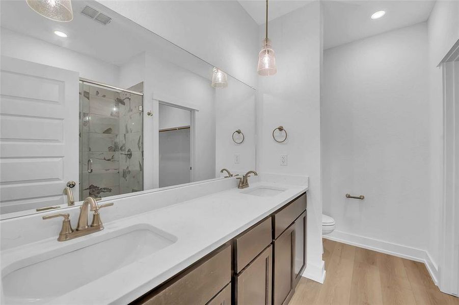 Please Note: These interior photos are not of the actual home but are of a completed one with a similar floor plan. Finishes, features, and layouts may vary.