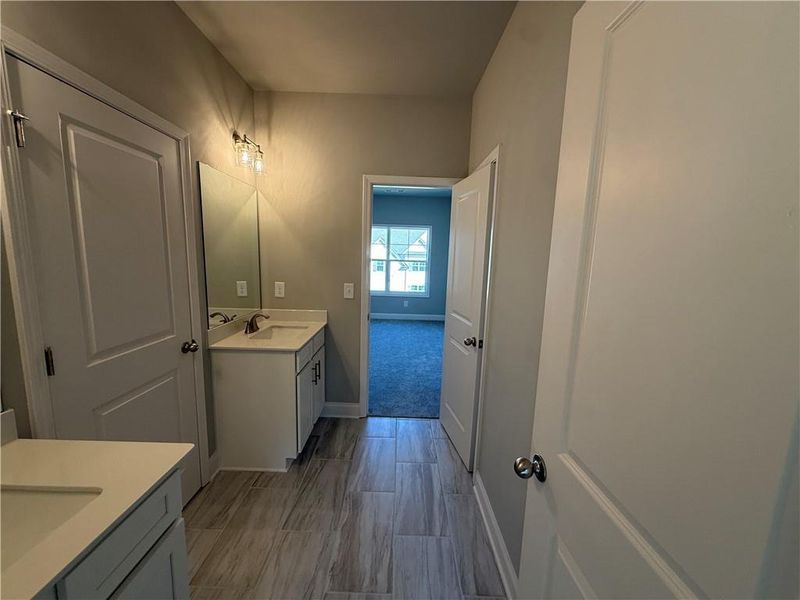 Furnished interior view inside a new home in Hidden Fields, Hoschton (Image 14).