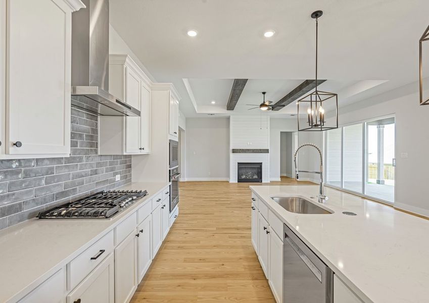 The kitchen has stainless steel appliances.
