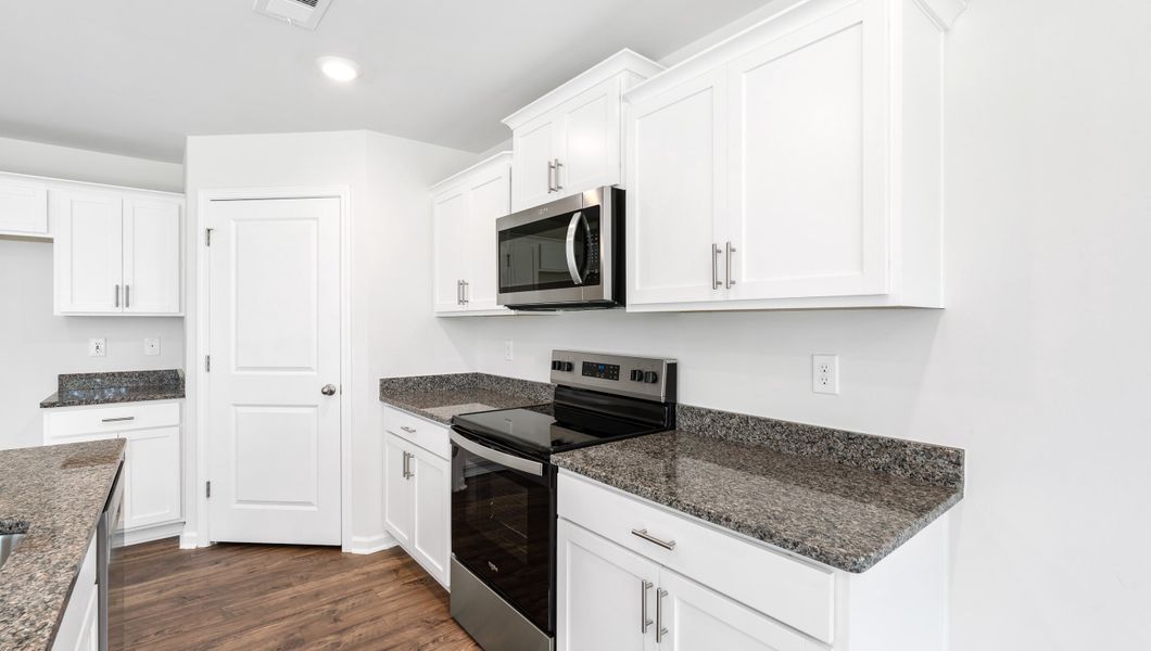 Furnished interior view inside a new home in Harper Ridge, Roebuck (Image 10).