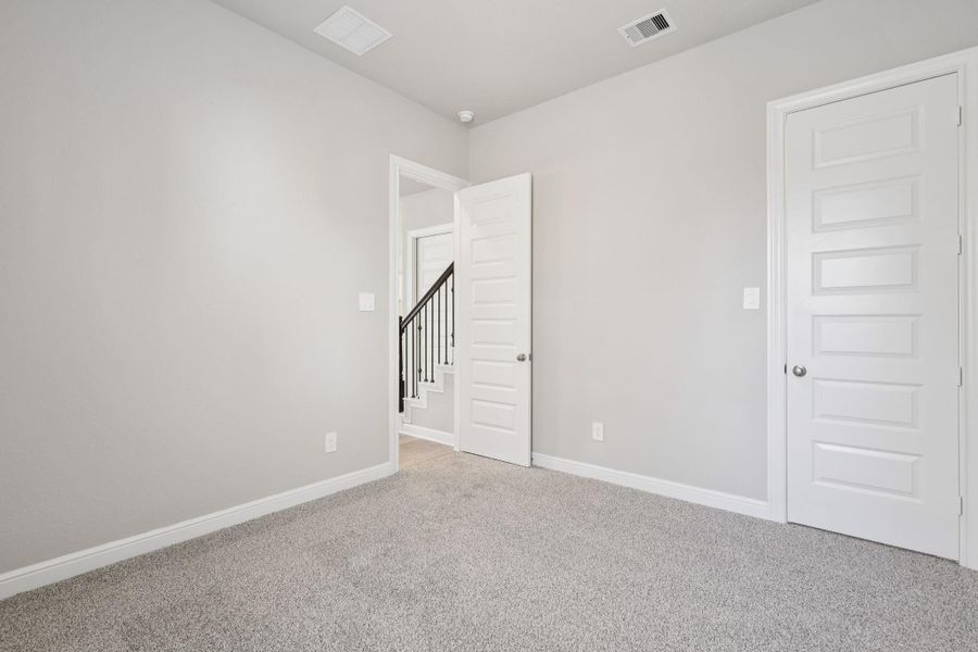 Spacious, unfurnished interior of a new home in Kemah Crossing - Luxe Series, Kemah (Image 18). Spacious, unfurnished interior of a new home in Kemah Crossing - Luxe Series, Kemah (Image 18).