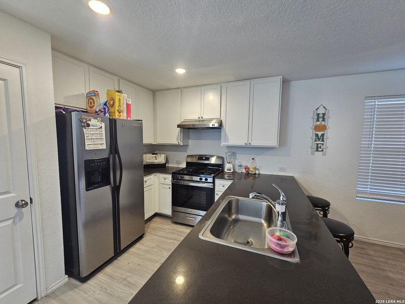 Furnished interior view inside a new home in , Seguin (Image 11).
