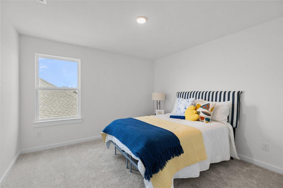 Furnished interior view inside a new home in Sunterra, Katy (Image 6).