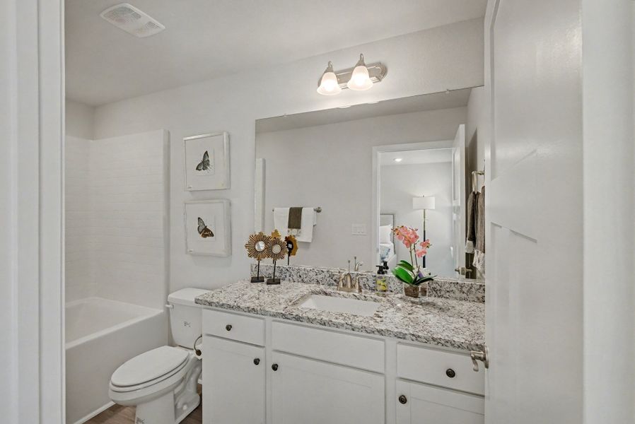 Representative furnished interior of a home built from the Plan 1250 by Adams Homes in Turtle Creek, Cantonment (Image 7).