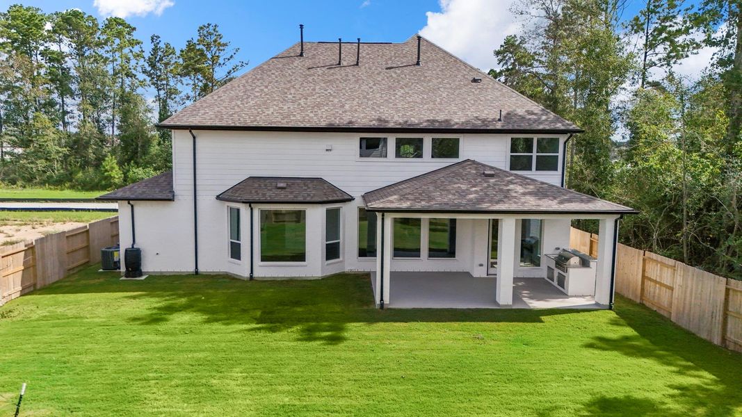 Exterior details and patio area of a home in ARTAVIA, Conroe (Image 3). Exterior details and patio area of a home in ARTAVIA, Conroe (Image 3).