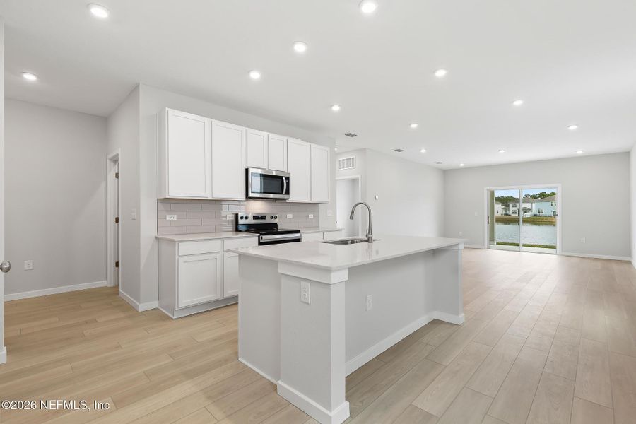 Furnished interior view inside a new home in The Landings at Pecan Park, Jacksonville (Image 6). Furnished interior view inside a new home in The Landings at Pecan Park, Jacksonville (Image 6).