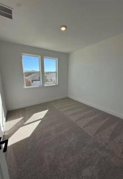 Spacious, unfurnished interior of a new home in Sage Collection – Freedom at Anthem, Kyle (Image 13).