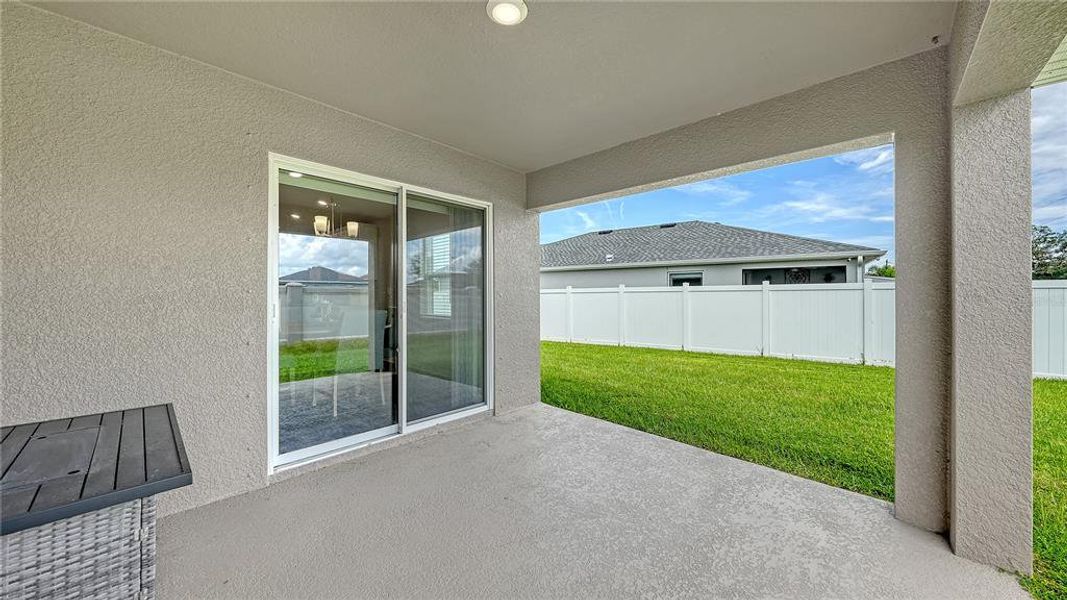 Exterior details and patio area of a home in , Palmetto (Image 27).