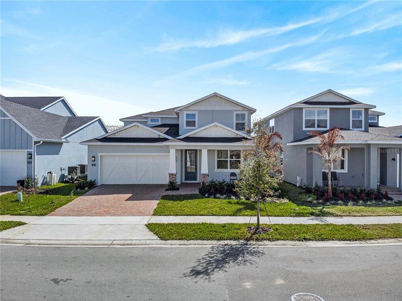 Front exterior of a new home in , Sanford, FL, highlighting curb appeal (Image 26).