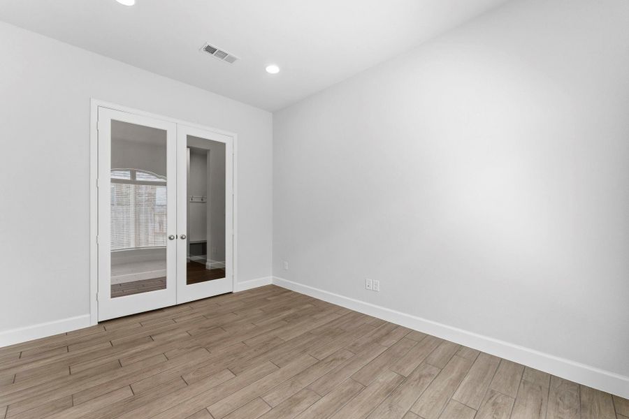 Flex Room/Home Office with Tile Flooring and Dual Glass Doors for Privacy Flex Room/Home Office with Tile Flooring and Dual Glass Doors for Privacy