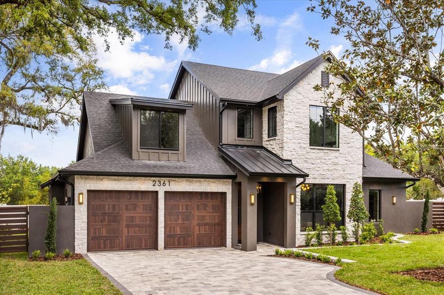 Front exterior of a new home in , Winter Park, FL, highlighting curb appeal (Image 27). Front exterior of a new home in , Winter Park, FL, highlighting curb appeal (Image 27).