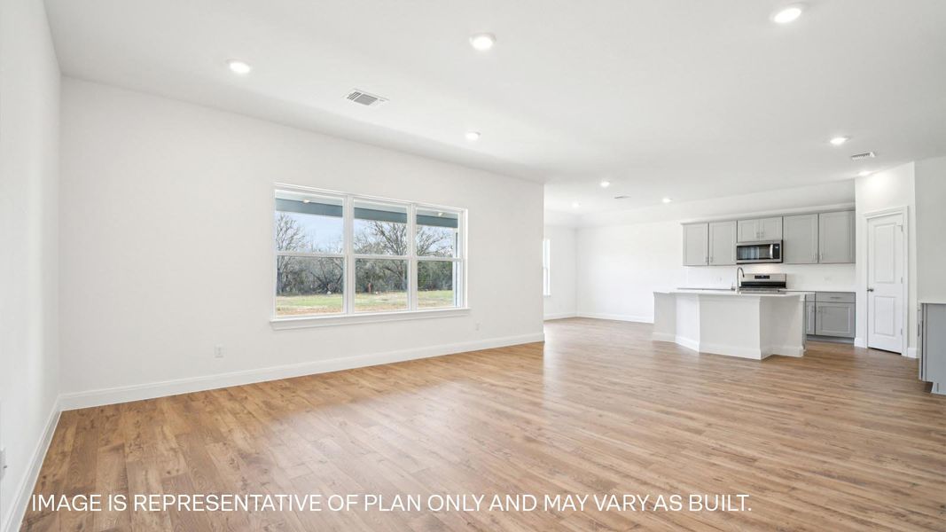 Representative unfurnished interior of a home built from the The Hudson by D.R. Horton in Railhead, Cedar Creek (Image 11).