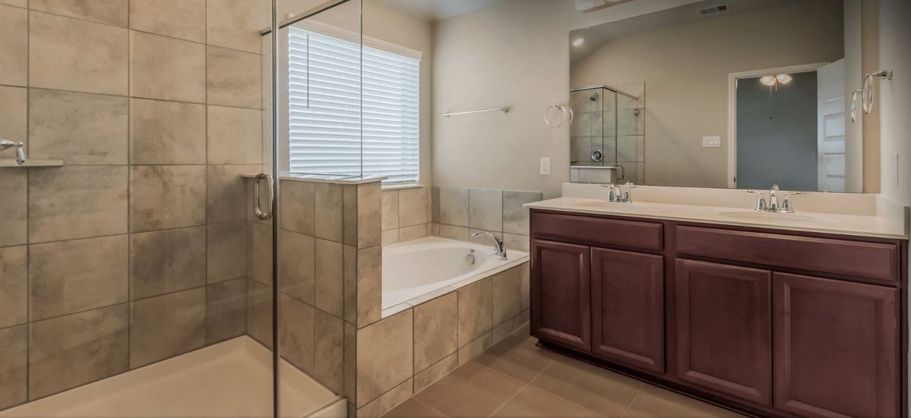 Pamper yourself in the luxurious primary bathroom.