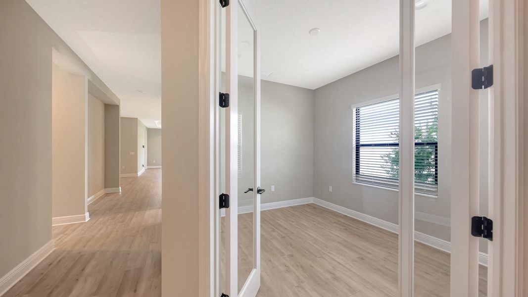 Spacious, unfurnished interior of a new home in Palm Grove Real Estate and Homes for Sale in Lakewood Ranch, FL - Neal Communities, Lakewood Ranch (Image 16). Spacious, unfurnished interior of a new home in Palm Grove Real Estate and Homes for Sale in Lakewood Ranch, FL - Neal Communities, Lakewood Ranch (Image 16).