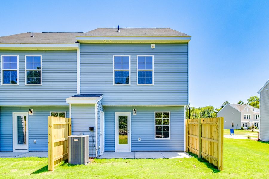 Exterior details and patio area of a home in Padgett Commons, Hopkins (Image 4).