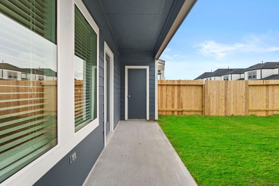 Exterior details and patio area of a home in Grand West, Houston (Image 19).