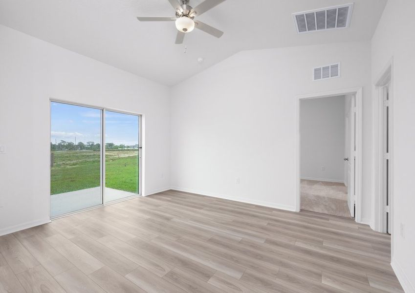 The living room flows seamlessly into the back yard The living room flows seamlessly into the back yard