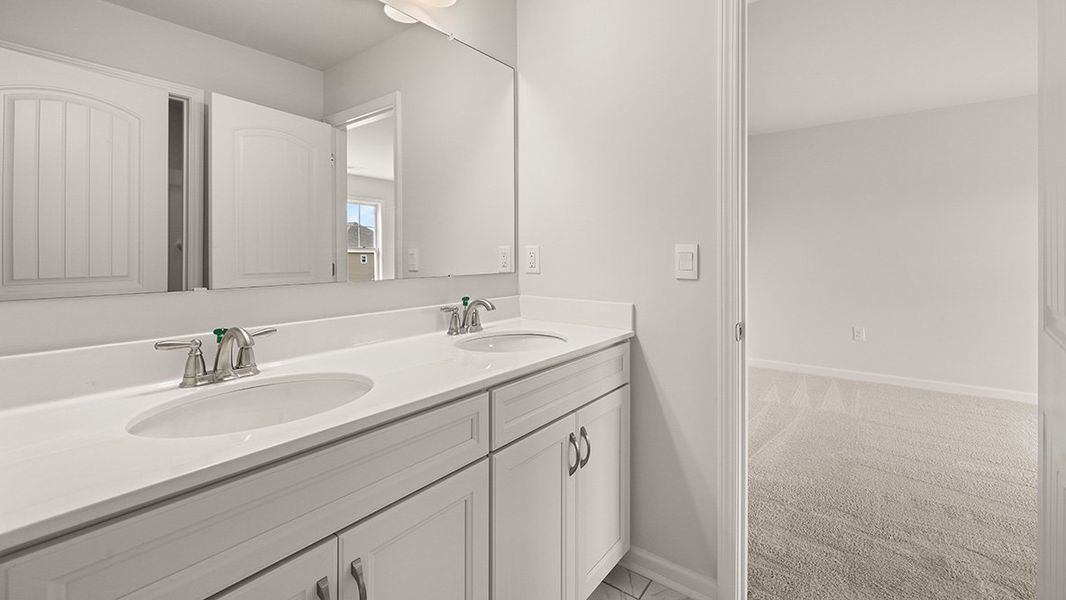 Representative furnished interior of a home built from the WESTERLY by D.R. Horton in Haven Abbey, Cumming (Image 13).