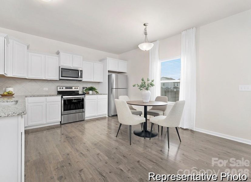 Furnished interior view inside a new home in Whispering Hills, Locust (Image 8).