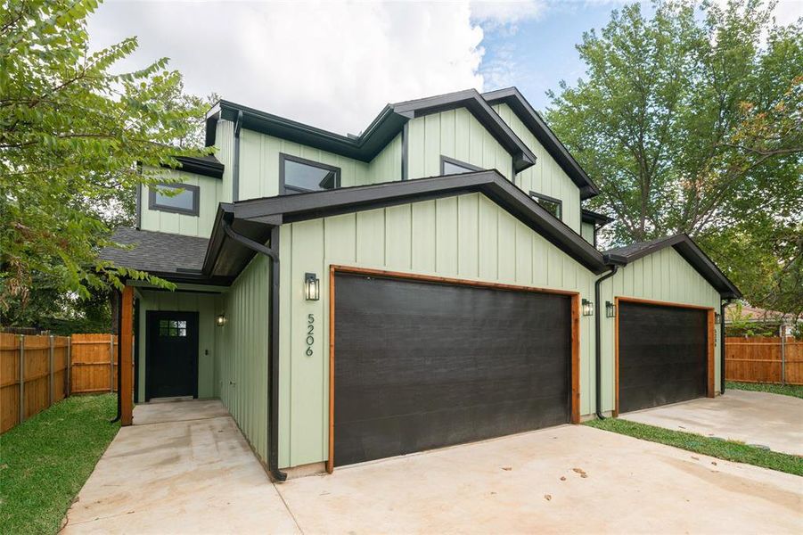 Modern Craftsman Style Townhome featuring a designated garage