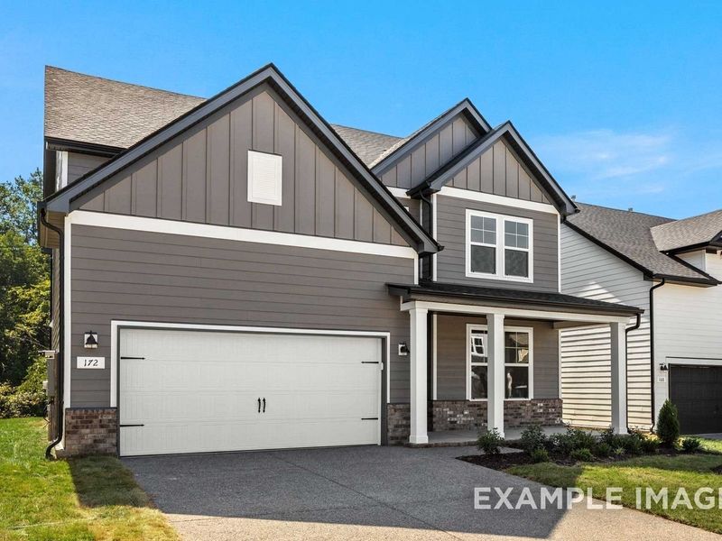 Front exterior of a new home in Woods Crossing, Gallatin, TN, highlighting curb appeal (Image 27).