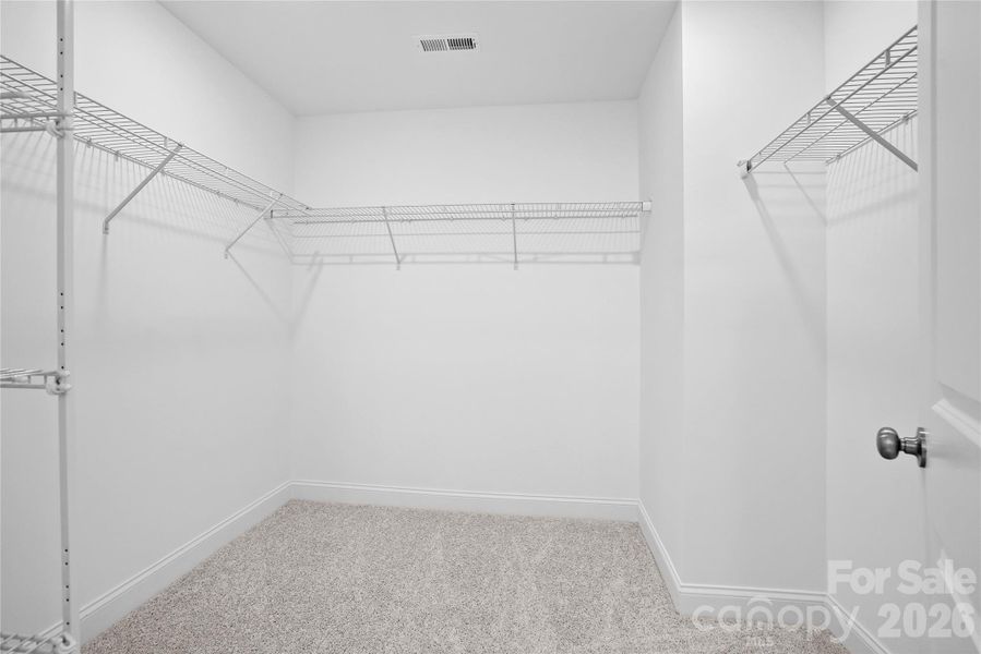 1 of 2 closets in owner's suite