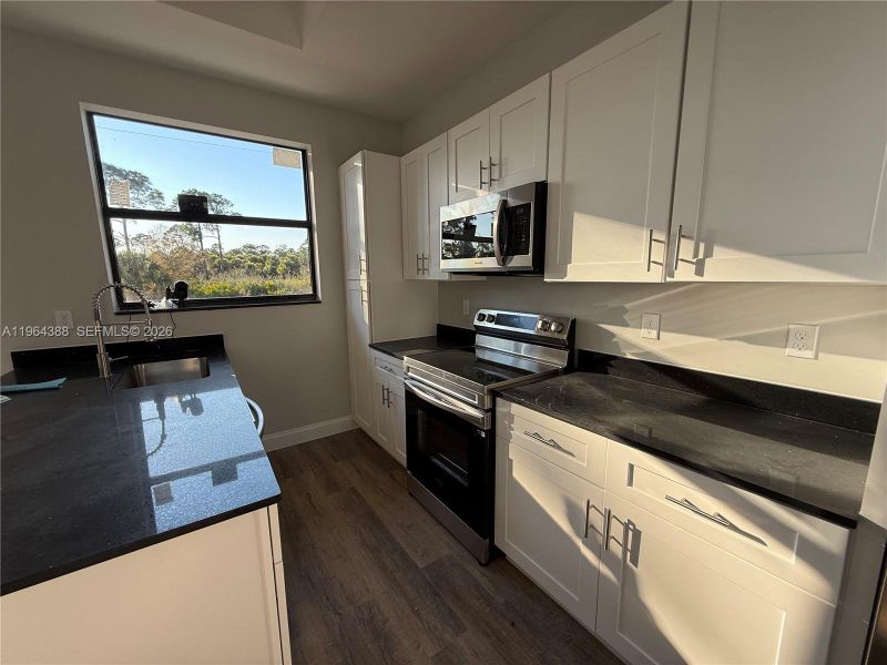 Furnished interior view inside a new home in , Lehigh Acres (Image 4).
