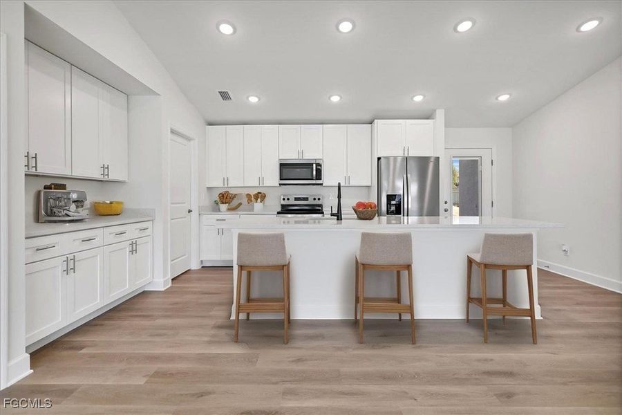 Furnished interior view inside a new home in Cape Coral, Cape Coral (Image 6). Furnished interior view inside a new home in Cape Coral, Cape Coral (Image 6).