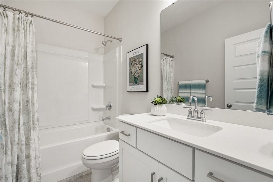 A well-appointed bathroom features a combined show A well-appointed bathroom features a combined show