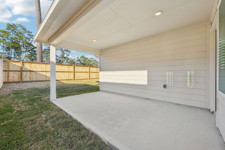 Exterior details and patio area of a home in , Conroe (Image 20).