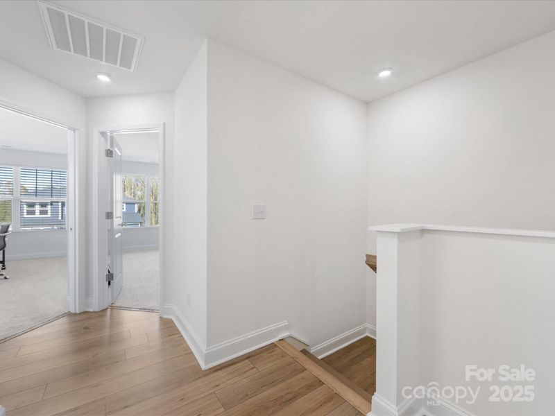 Spacious, unfurnished interior of a new home in Smith Farm, Belmont (Image 19).