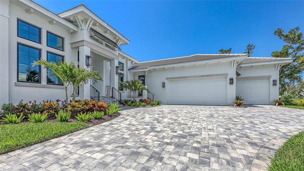 Exterior details and patio area of a home in , Longboat Key (Image 40).