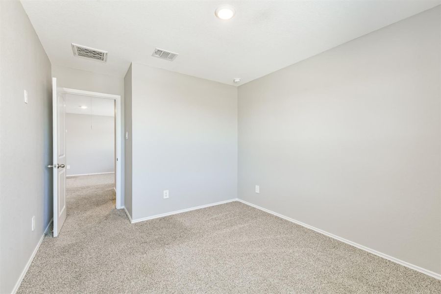 Spacious, unfurnished interior of a new home in Harrington Trails at The Canopies, New Caney (Image 28).