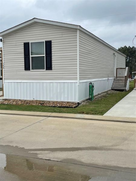 Exterior details and patio area of a home in , Tomball (Image 24).