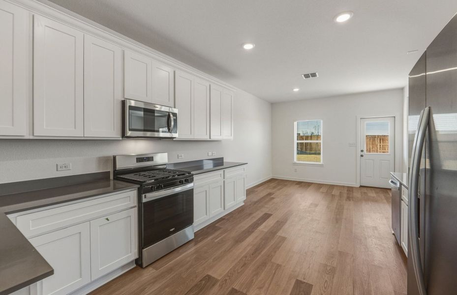 Furnished interior view inside a new home in Sunfield, Buda (Image 11).