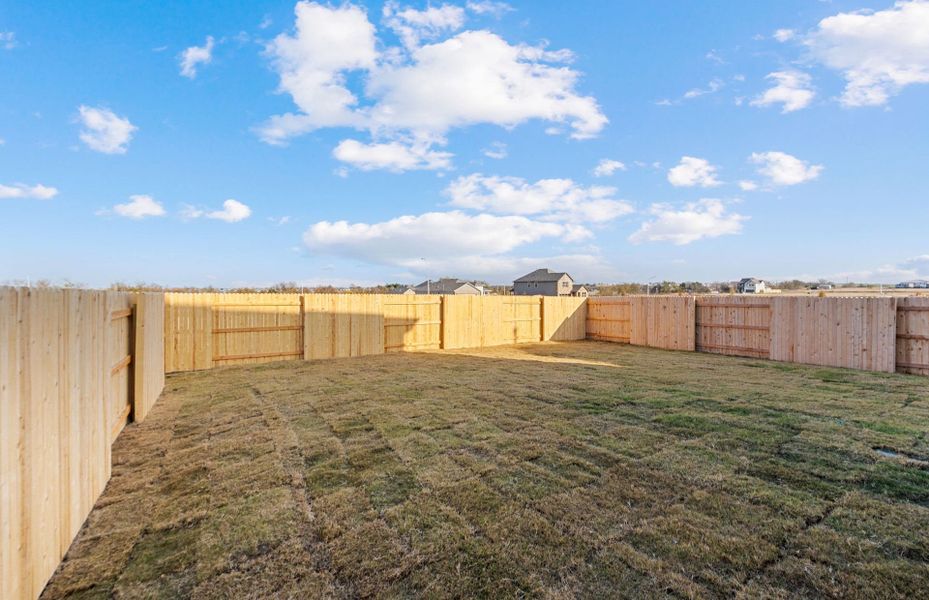 Exterior details and patio area of a home in Patterson Ranch, Georgetown (Image 22).