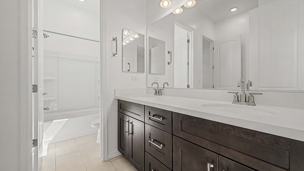 Furnished interior view inside a new home in Arroyo Seco - Hacienda, Buckeye (Image 20).
