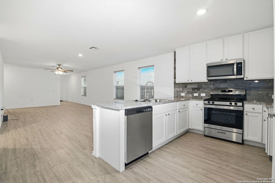 Furnished interior view inside a new home in Vida: Cottage Collection, San Antonio (Image 4). Furnished interior view inside a new home in Vida: Cottage Collection, San Antonio (Image 4).