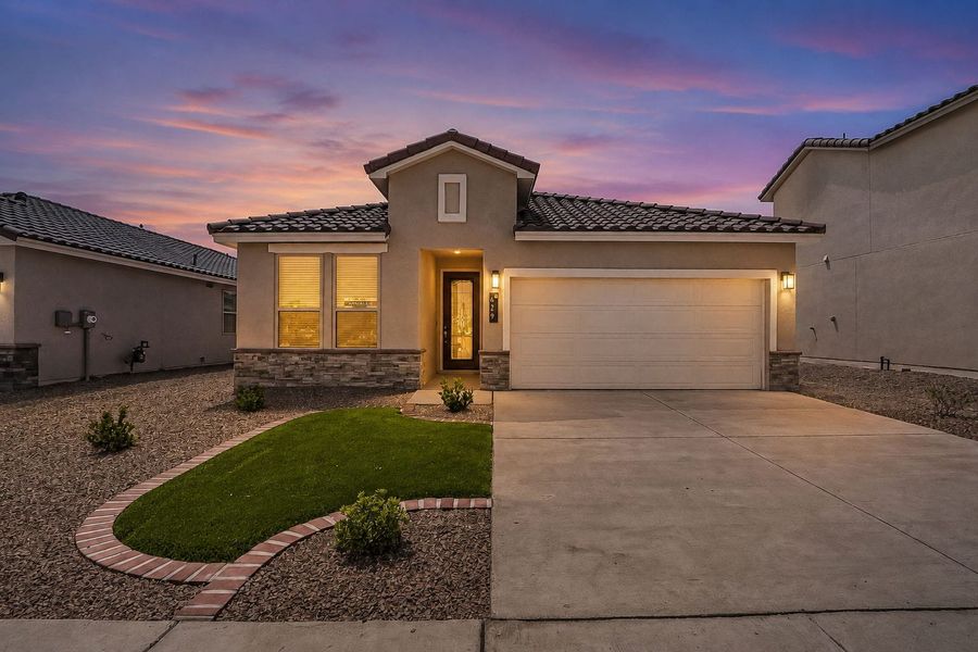 Front exterior of a new home in Paseos Del Este, El Paso, TX, highlighting curb appeal (Image 28).