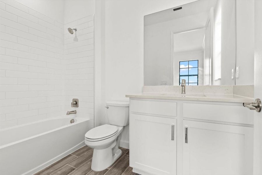 Furnished interior view inside a new home in Tesoro Club, Port St. Lucie (Image 9).
