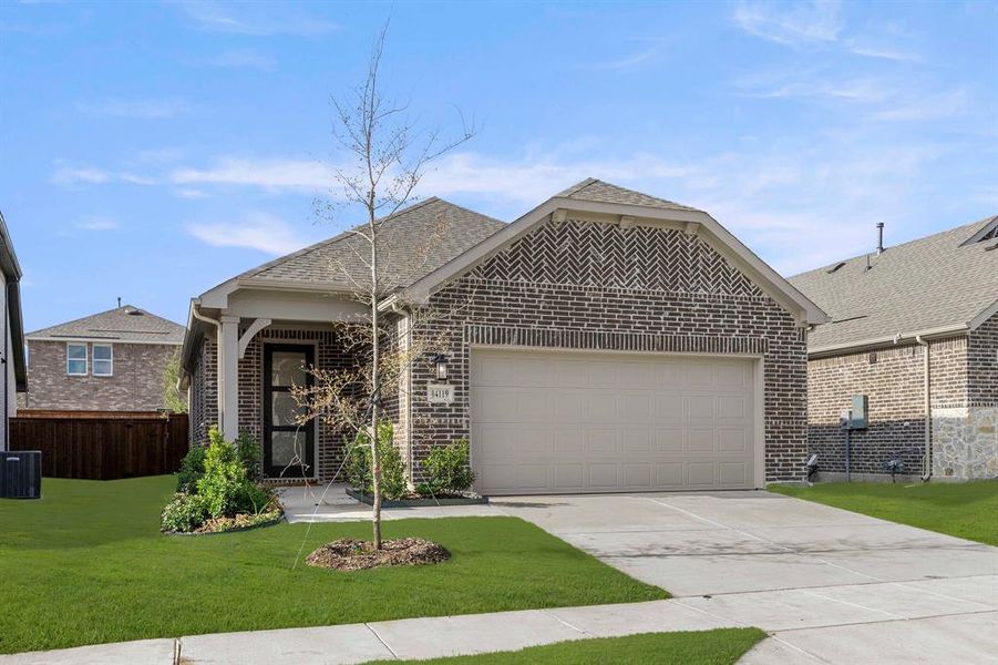 Front exterior of a new home in Creekview Fossil Ridge, Pilot Point, TX, highlighting curb appeal (Image 23).