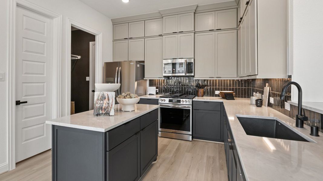 Representative furnished interior of a home built from the Mimosa by DRB Homes in Brookewater, Rosenberg (Image 13).