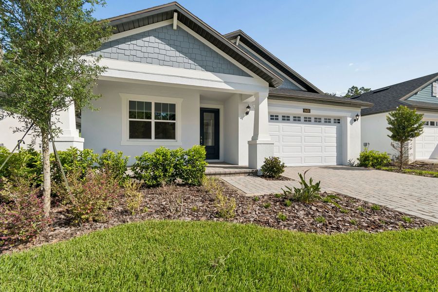 Front exterior of a new home in Southern Hills Plantation, Brooksville, FL, highlighting curb appeal (Image 24).