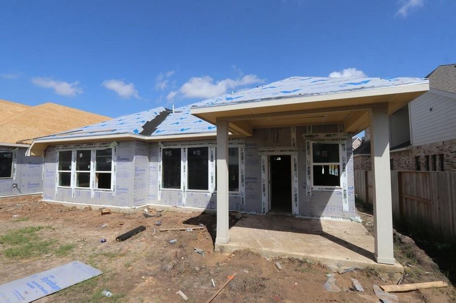Front exterior of a new home in Meridiana 55' Homesites, Manvel, TX, highlighting curb appeal (Image 18).